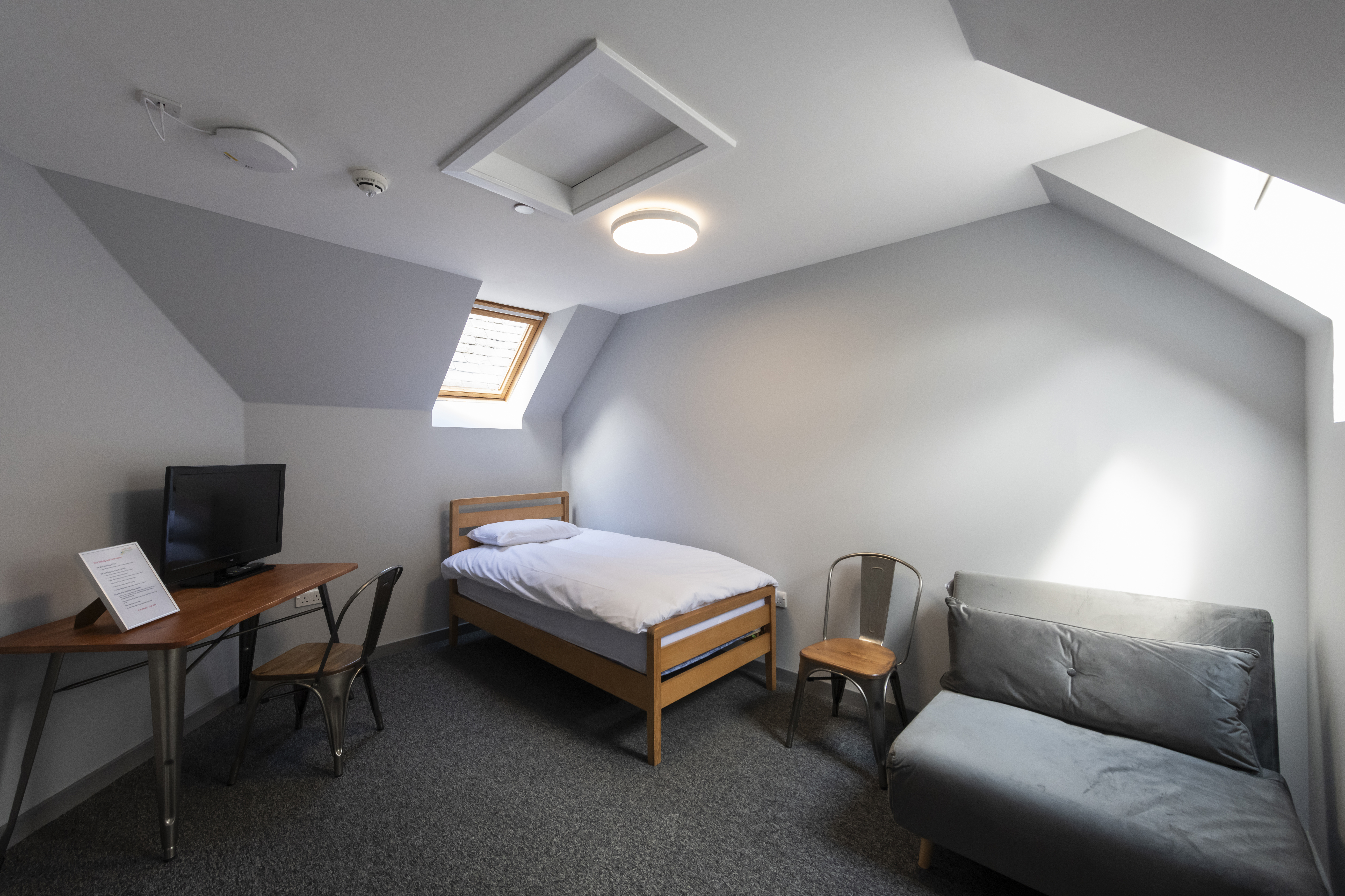 One of the two upstairs bedrooms