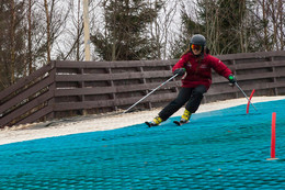 downhill skier on artificial slope