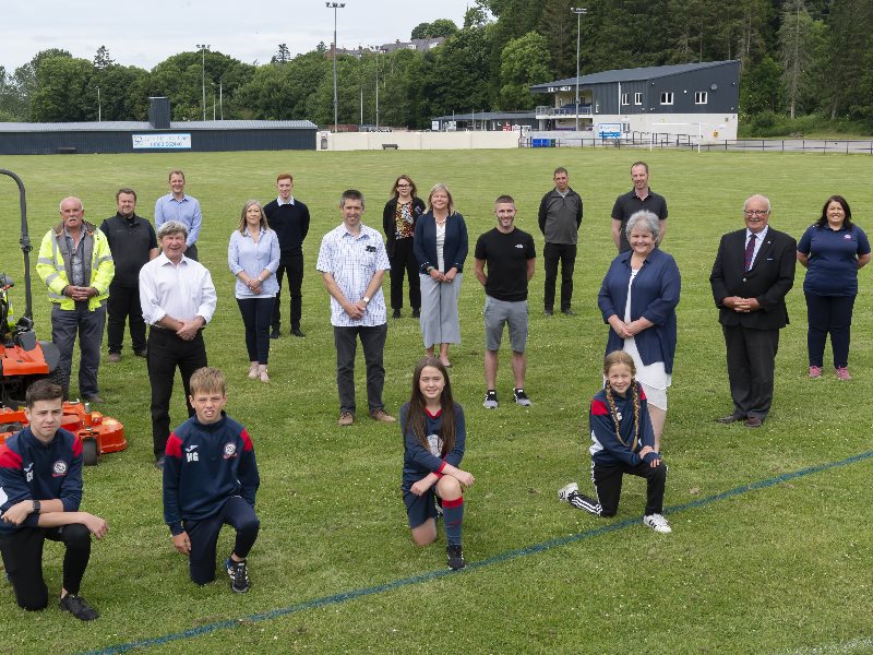members of the club at the Haughs pitches which they will be taking on the maintenance for