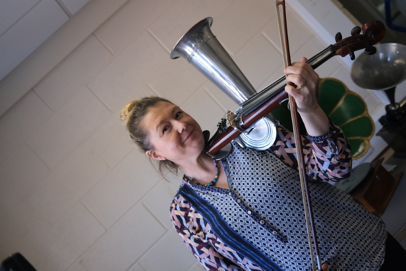 photo of musician playing stroh violin