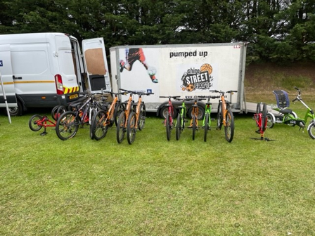 bikes lined up in front of a trailer