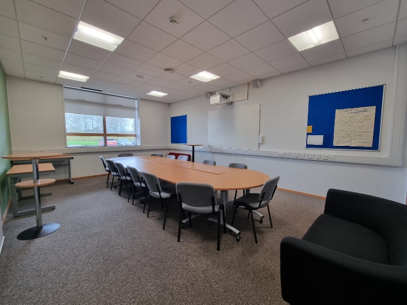 The conference meeting room at Ellon with tables and chairs